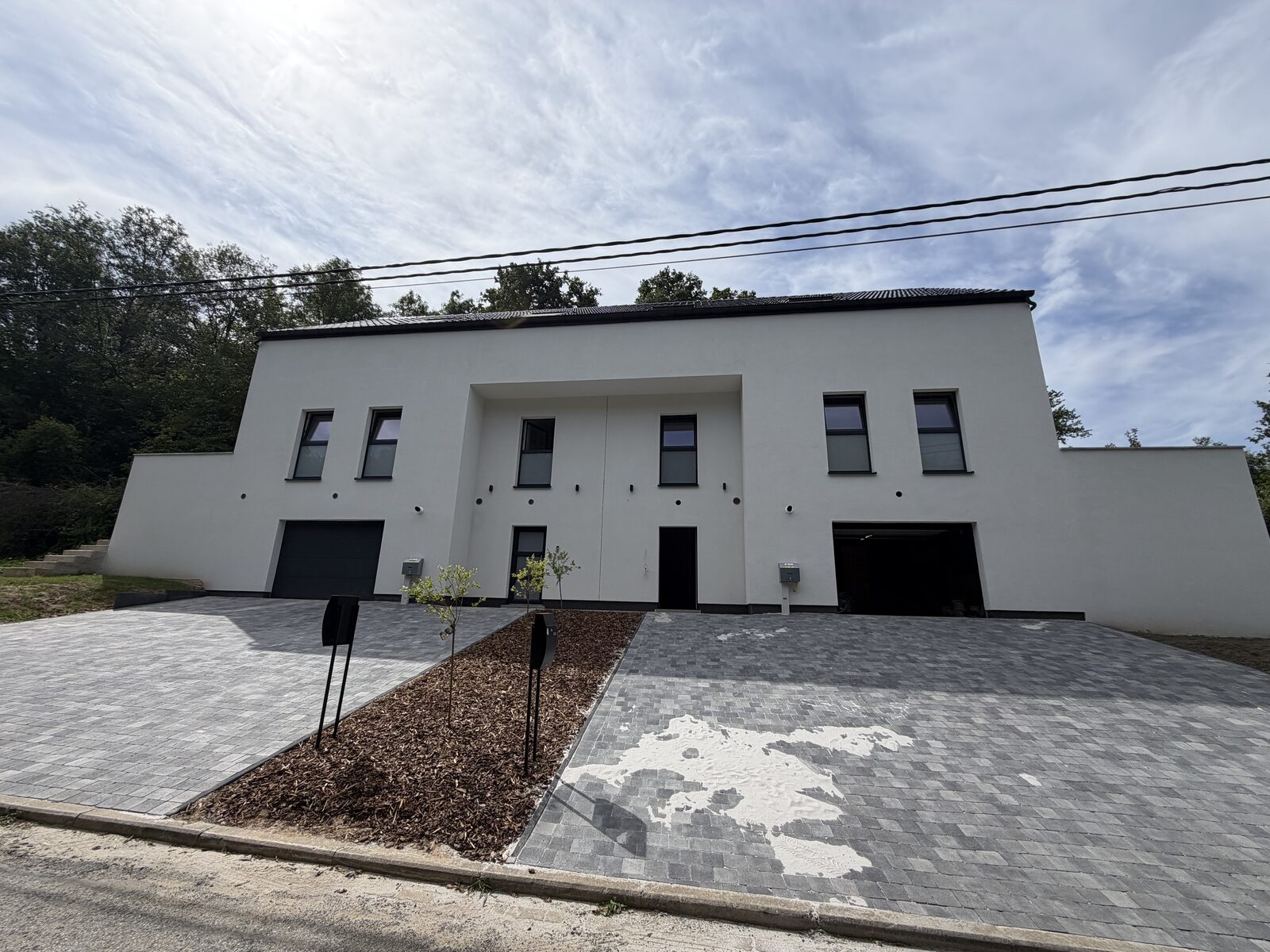 Construction neuve — réalisation MP Châssis, Charleroi et Hainaut